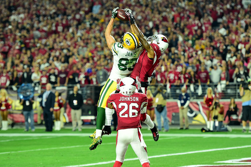 GLENDALE, AZ - JANUARY 16: Wide receiver Jeff Janis #83 of the Green Bay Packers catches a 41-yard touchdown on the final play of regulation against cornerback Patrick Peterson #21 of the Arizona Cardinals in the NFC Divisional Playoff Game at University of Phoenix Stadium on January 16, 2016 in Glendale, Arizona. (Photo by Harry How/Getty Images)