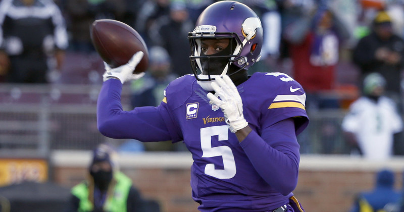 Minnesota Vikings quarterback Teddy Bridgewater (5) warms up before an NFL wild-card football game against the Seattle Seahawks, Sunday, Jan. 10, 2016, in Minneapolis. (AP Photo/Jim Mone)