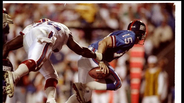 27 Jan 1991: Quarterback Jeff Hostetler of the New York Giants gets sacked during Super Bowl XXV against the Buffalo Bills at Tampa Stadium in Tampa, Florida. The Giants won the game, 20-19. Mandatory Credit: Mike Powell /Allsport